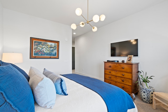 bedroom featuring carpet and a notable chandelier