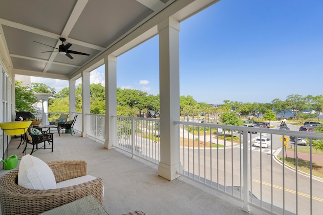 exterior space with ceiling fan