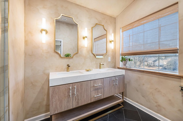 bathroom with vanity and tile patterned floors