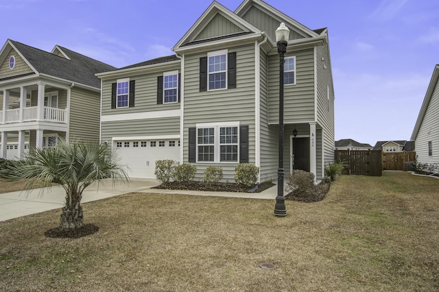 view of front facade with a garage and a front lawn