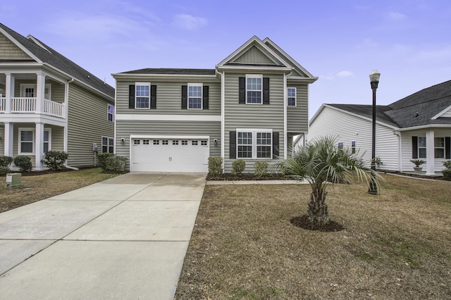 view of front facade with a front lawn and a garage