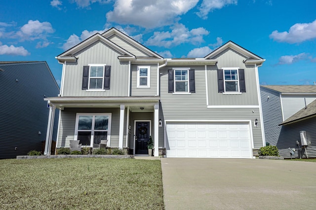 view of front of house featuring a porch, concrete driveway, board and batten siding, a front yard, and a garage