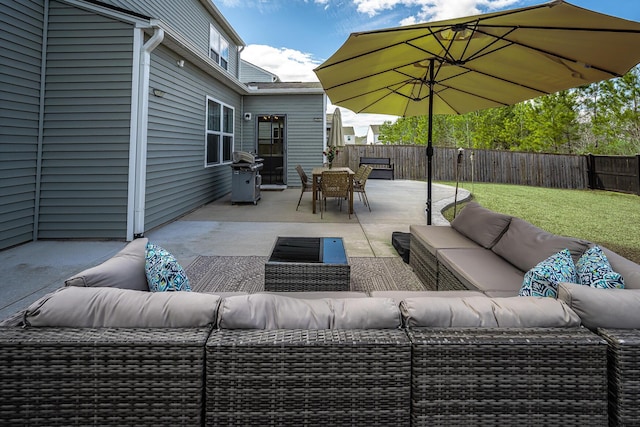 view of patio featuring outdoor lounge area, outdoor dining area, a fenced backyard, and a grill