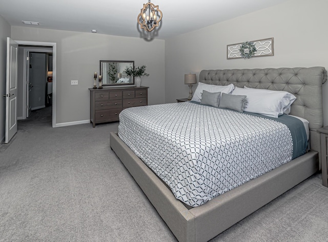 bedroom with a notable chandelier, carpet flooring, baseboards, and visible vents