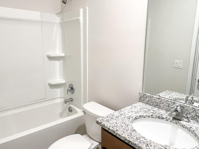 full bathroom featuring shower / washtub combination, vanity, and toilet