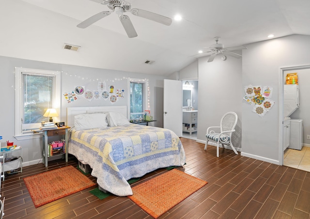 bedroom featuring wood finished floors, vaulted ceiling, and visible vents
