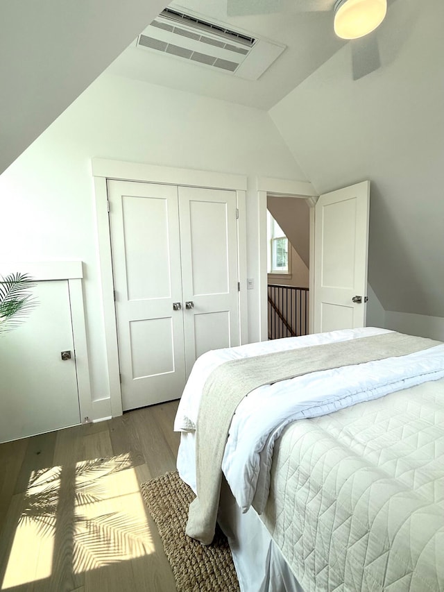 30 Nats Ct, Charleston, SC 29403 - bedroom featuring wood finished floors, vaulted ceiling, and a closet