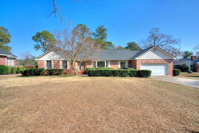 single story home featuring a garage and a front lawn