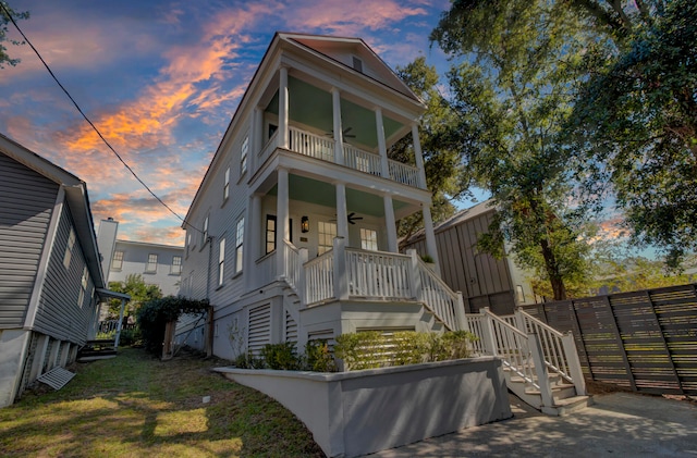 view of front of home featuring a balcony and a porch