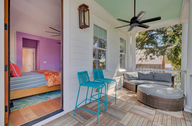 wooden terrace with ceiling fan