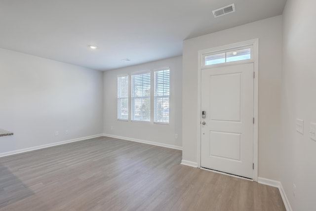 entrance foyer with light hardwood / wood-style floors