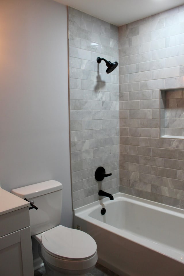 full bathroom with shower / bath combination, toilet, and vanity