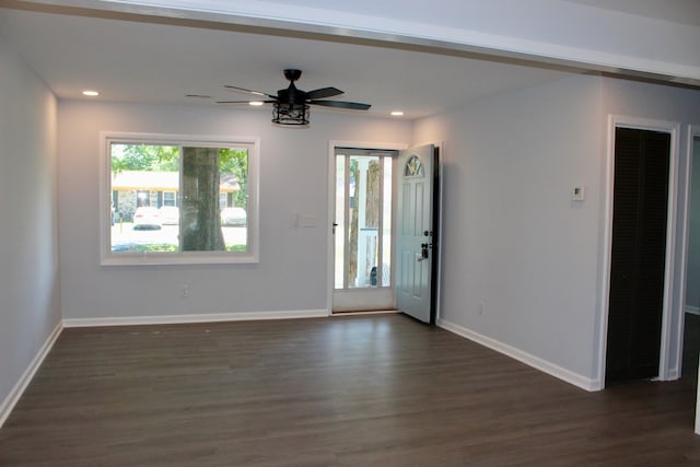 foyer entrance featuring recessed lighting, dark wood-style flooring, and baseboards