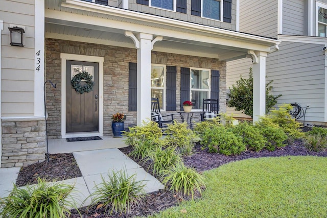 entrance to property with covered porch