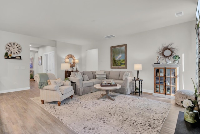 living room featuring light hardwood / wood-style flooring