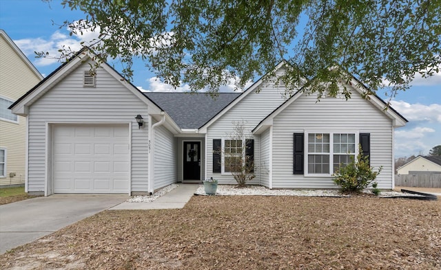 ranch-style home featuring a garage