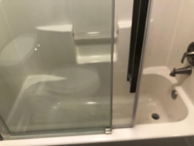 room details featuring walk in shower