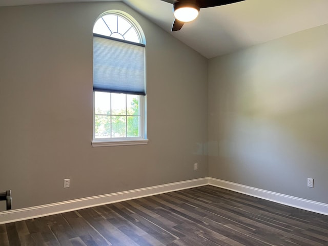 unfurnished room with ceiling fan, baseboards, and dark wood-style floors