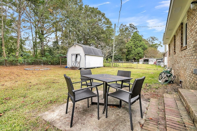 view of patio / terrace with a storage unit