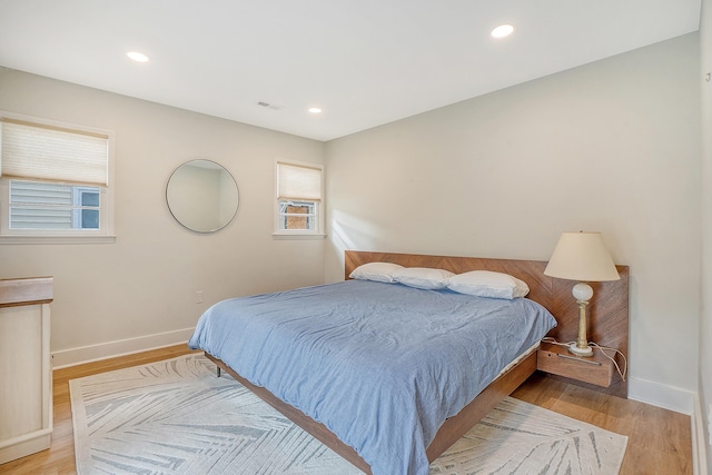 bedroom featuring light wood-type flooring