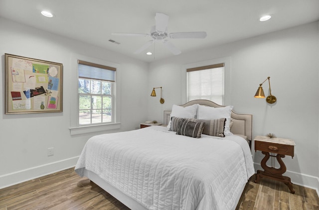 bedroom featuring ceiling fan and wood-type flooring