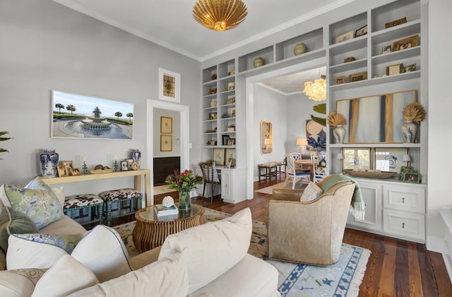 living area with built in features, dark wood-type flooring, and ornamental molding