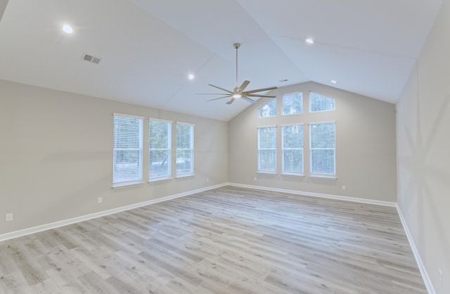 277 W Smith St, Lincolnville, SC 29485 - spare room featuring healthy amount of natural light, vaulted ceiling, light wood-style flooring, a ceiling fan, and baseboards