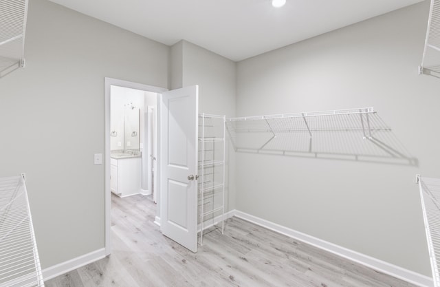 277 W Smith St, Lincolnville, SC 29485 - walk in closet featuring wood finished floors