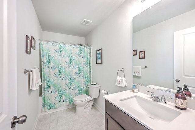 full bathroom with vanity, toilet, and shower / tub combo with curtain