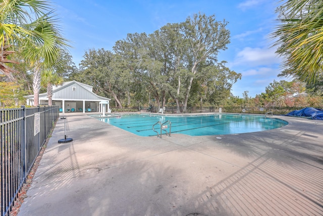 view of pool featuring a patio area