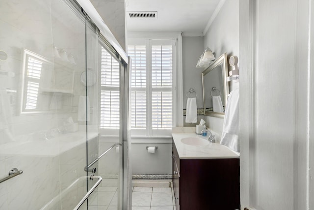 bathroom with walk in shower, vanity, and plenty of natural light