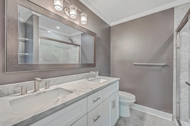 full bath featuring a sink, toilet, ornamental molding, and a shower stall