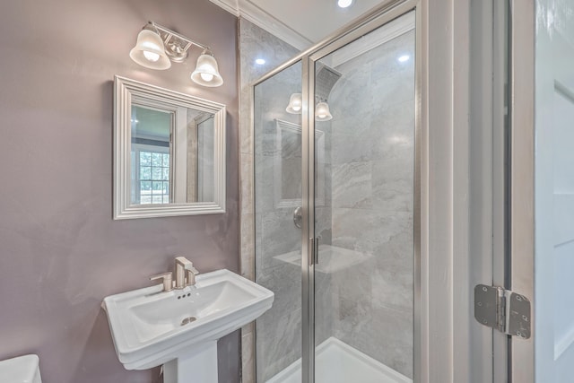 full bath featuring a sink and a stall shower