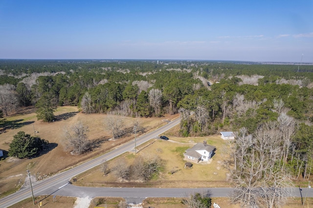 aerial view featuring a rural view and a view of trees