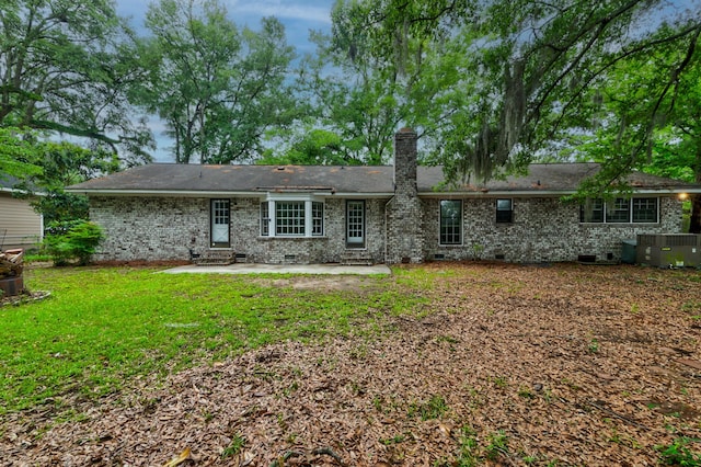 5322 Chantilly Ln, North Charleston, SC 29418 - rear view of property featuring crawl space, entry steps, a patio, a chimney, and central AC unit