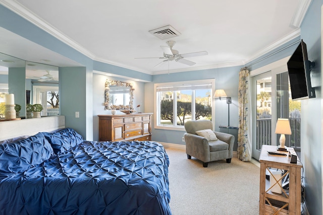 carpeted bedroom featuring crown molding and ceiling fan