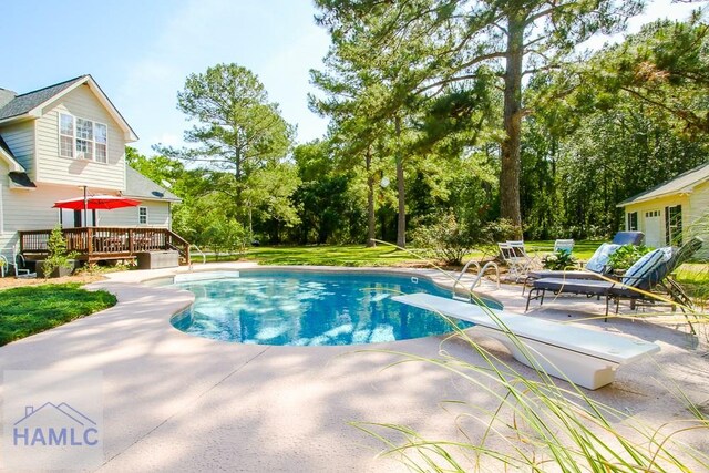 4800 Bay Branch Church Rd, Claxton, GA 30417 - outdoor pool with a wooden deck, a patio area, and view of scattered trees