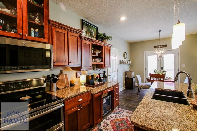 4800 Bay Branch Church Rd, Claxton, GA 30417 - kitchen with stainless steel appliances, a sink, a chandelier, open shelves, and dark wood-style flooring