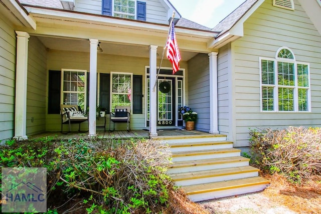 4800 Bay Branch Church Rd, Claxton, GA 30417 - doorway to property featuring covered porch and roof with shingles