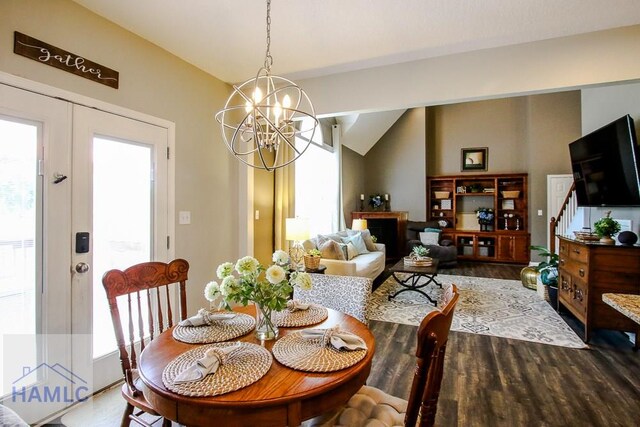 4800 Bay Branch Church Rd, Claxton, GA 30417 - dining space with wood finished floors, a chandelier, healthy amount of natural light, and vaulted ceiling