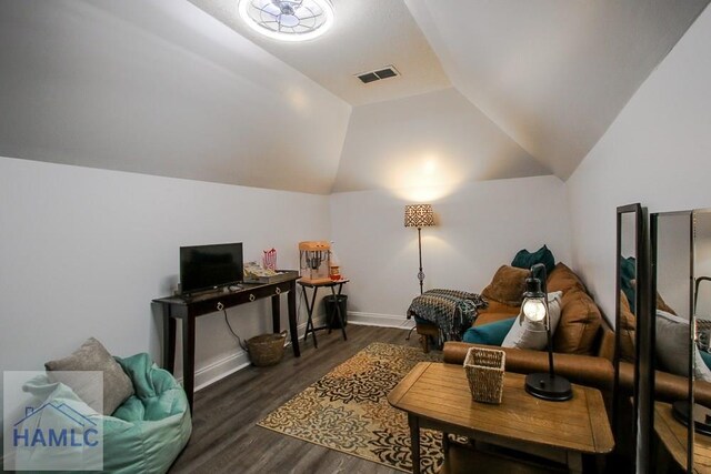 4800 Bay Branch Church Rd, Claxton, GA 30417 - living area with lofted ceiling, wood finished floors, and baseboards