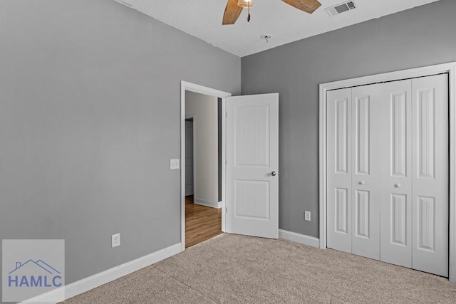 333 Grayson Ave, Hinesville, GA 31313 - unfurnished bedroom featuring carpet, a closet, baseboards, and ceiling fan