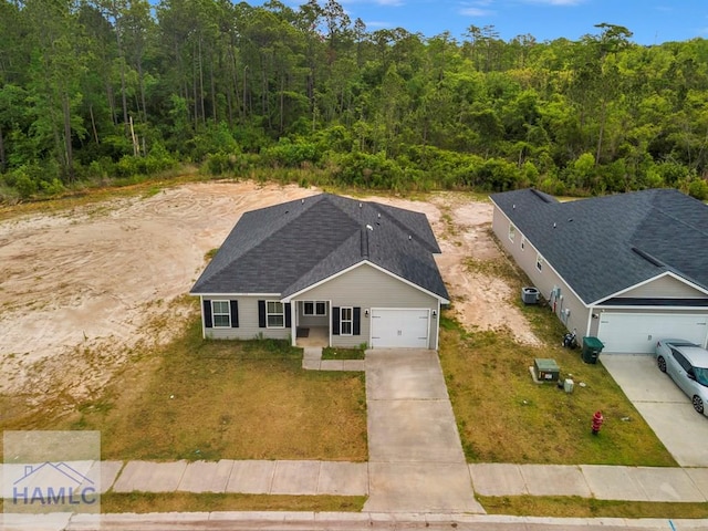 333 Grayson Ave, Hinesville, GA 31313 - aerial view of property and surrounding area featuring a heavily wooded area