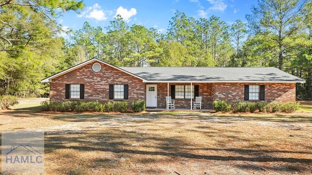 ranch-style house featuring covered porch