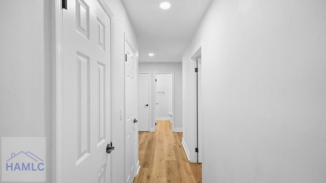 hallway featuring light hardwood / wood-style flooring