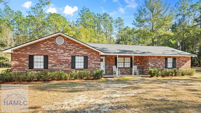 ranch-style home featuring a porch