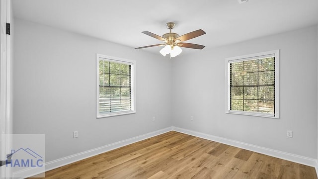 unfurnished room featuring ceiling fan, a healthy amount of sunlight, and light wood-type flooring