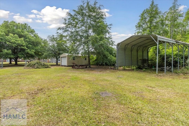 102 Penny Ln, Guyton, GA 31312 - view of green lawn with a carport