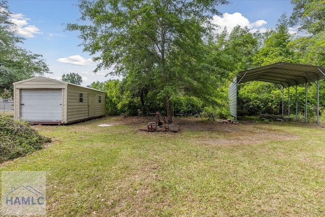 102 Penny Ln, Guyton, GA 31312 - view of green lawn featuring a detached carport