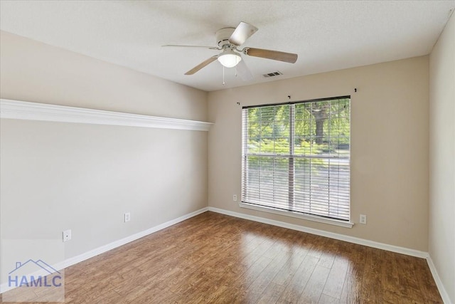 102 Penny Ln, Guyton, GA 31312 - unfurnished room with wood finished floors, ceiling fan, and baseboards
